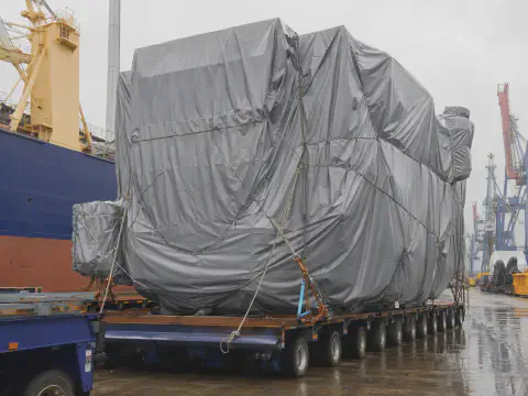 Heavy-duty tarpaulin cover for transformer marine cargo protection