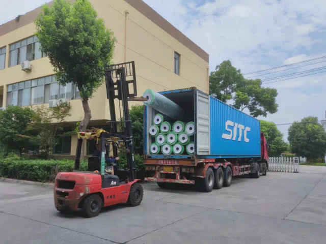 Bulk PP PE woven rolls loaded into container for international shipment